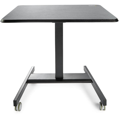 StarTech.com Mobile Standing Desk - Portable Sit Stand Ergonomic Height Adjustable Cart on Wheels - Rolling Computer/Laptop Workstation Table with Locking One-Touch Lift for Teacher/Student