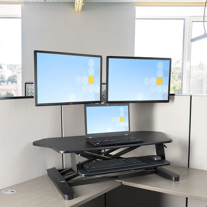 StarTech.com Corner Sit Stand Desk Converter with Keyboard Tray - Large Surface (35" x 21") - Height Adjustable Ergonomic Desktop/Tabletop Standing Workstation - Supports Dual Monitors - TAA
