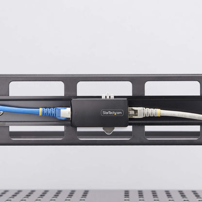 StarTech.com 1-Port Gigabit Network Isolator, Compact In-line RJ45 Ethernet Coupler with 4kV Galvanic Isolation, IP40, DIN Rail Mountable, TAA Compliant