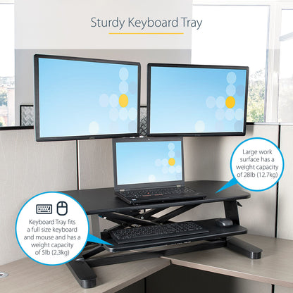 StarTech.com Corner Sit Stand Desk Converter with Keyboard Tray - Large Surface (35" x 21") - Height Adjustable Ergonomic Desktop/Tabletop Standing Workstation - Supports Dual Monitors - TAA