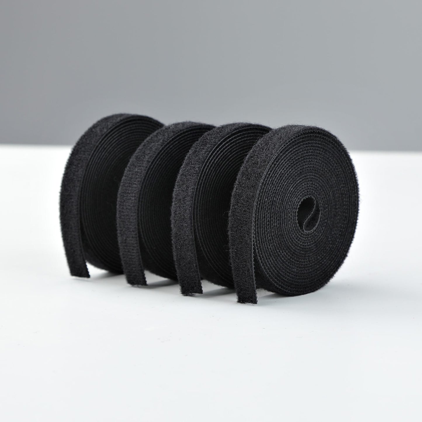 StarTech.com 4-pack 15ft (4.6m) Hook and Loop Roll, 0.5in Wide, Black, Cut-to-Size Reusable Cable Ties, Fastener Tape, Adjustable Fabric Wraps, Bulk Roll